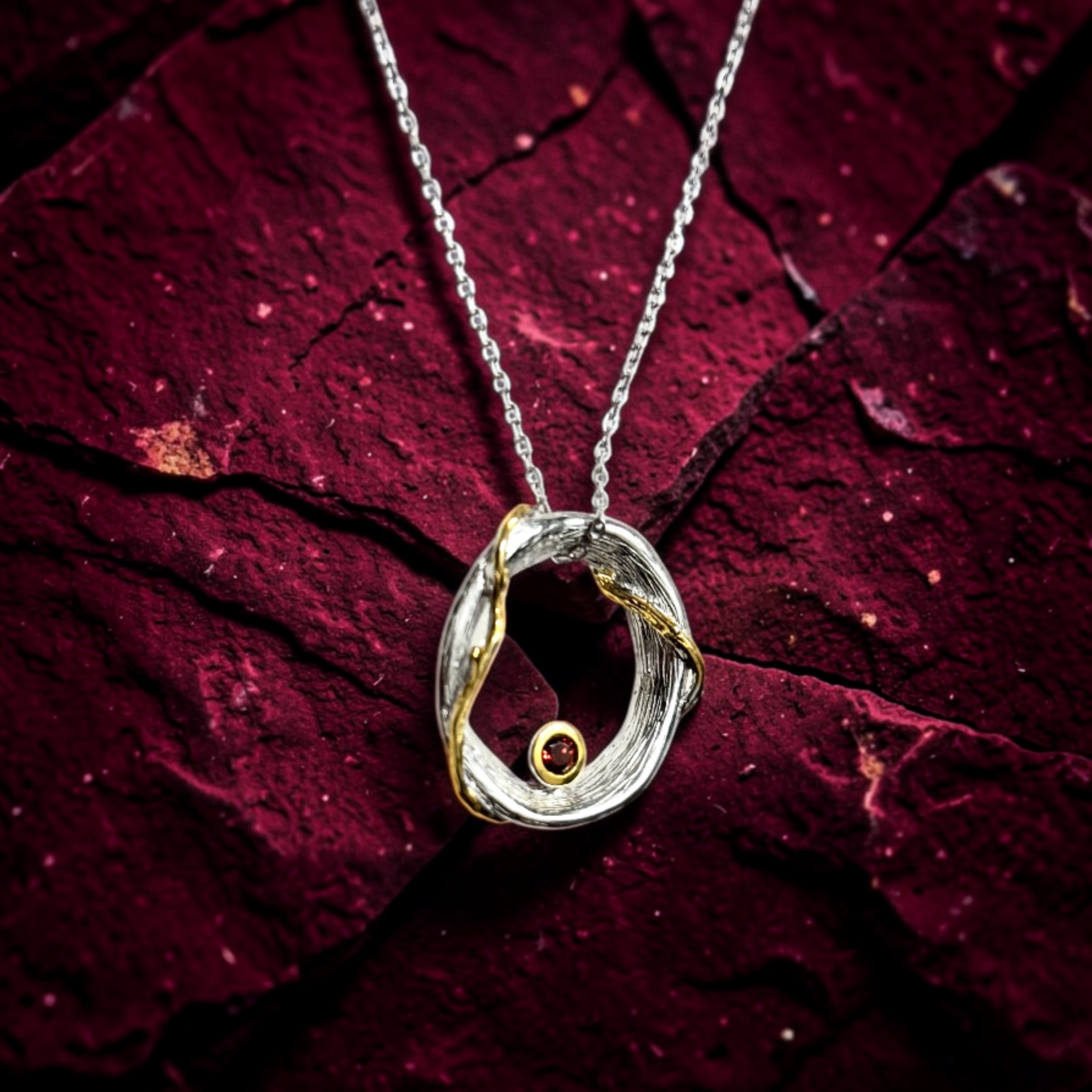 Golden Orbit Garnet Pendant Necklace
